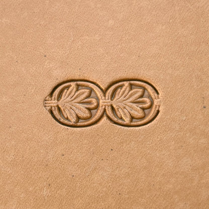 Double Oval 1 Leaf leather stamp LT170 — single impression on veg-tan leather