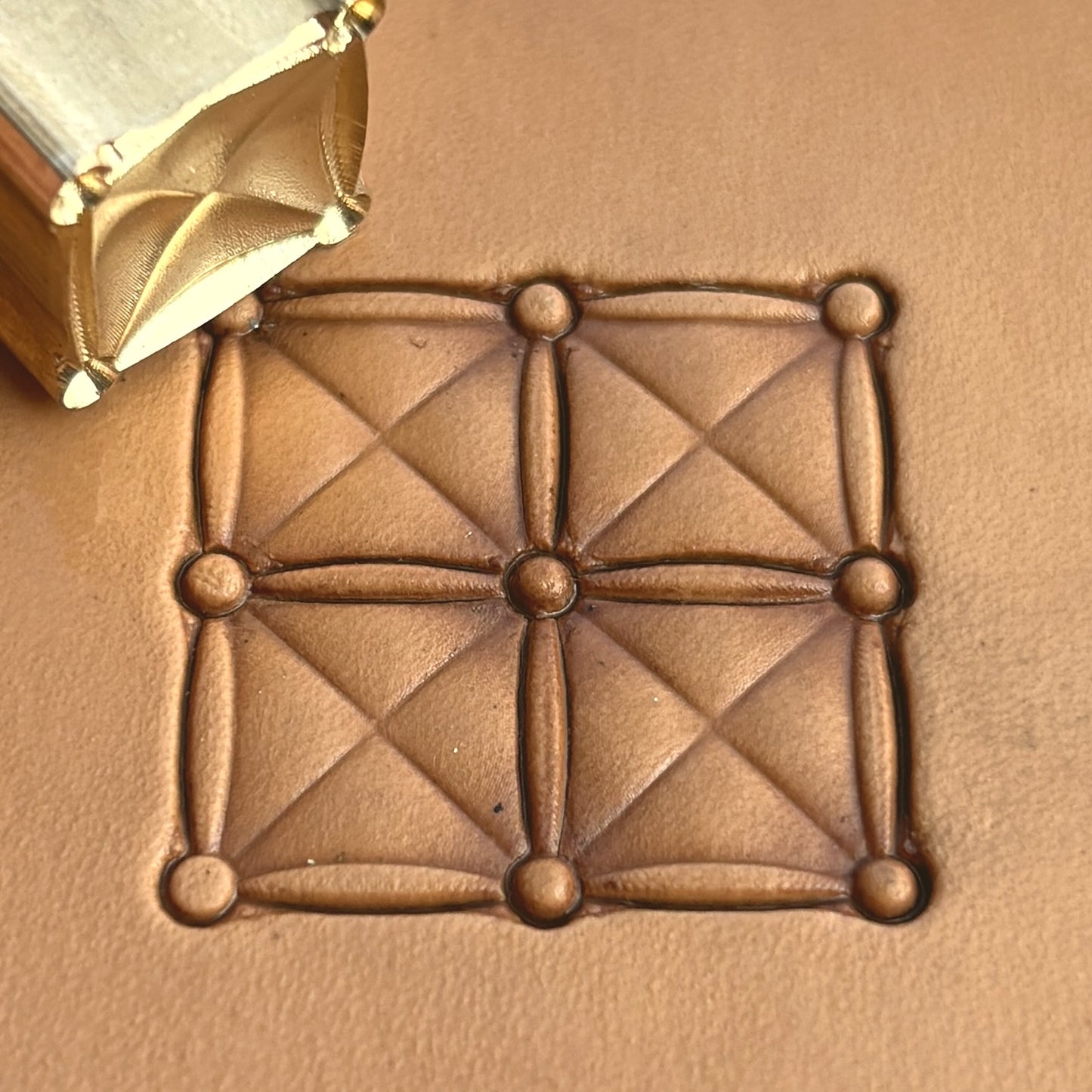 Geometric leather stamp LT172 — brass stamping tool with imprint on natural veg-tan leather