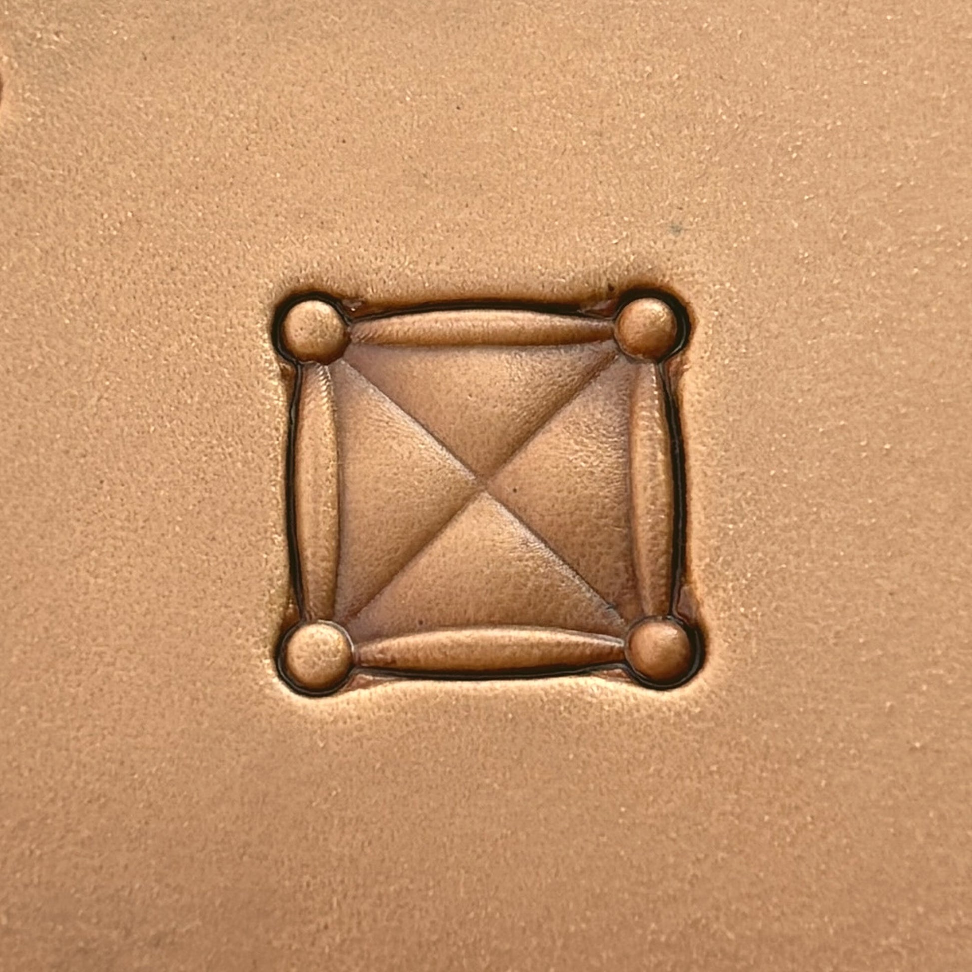 Geometric leather stamp LT172 — single impression on veg-tan leather