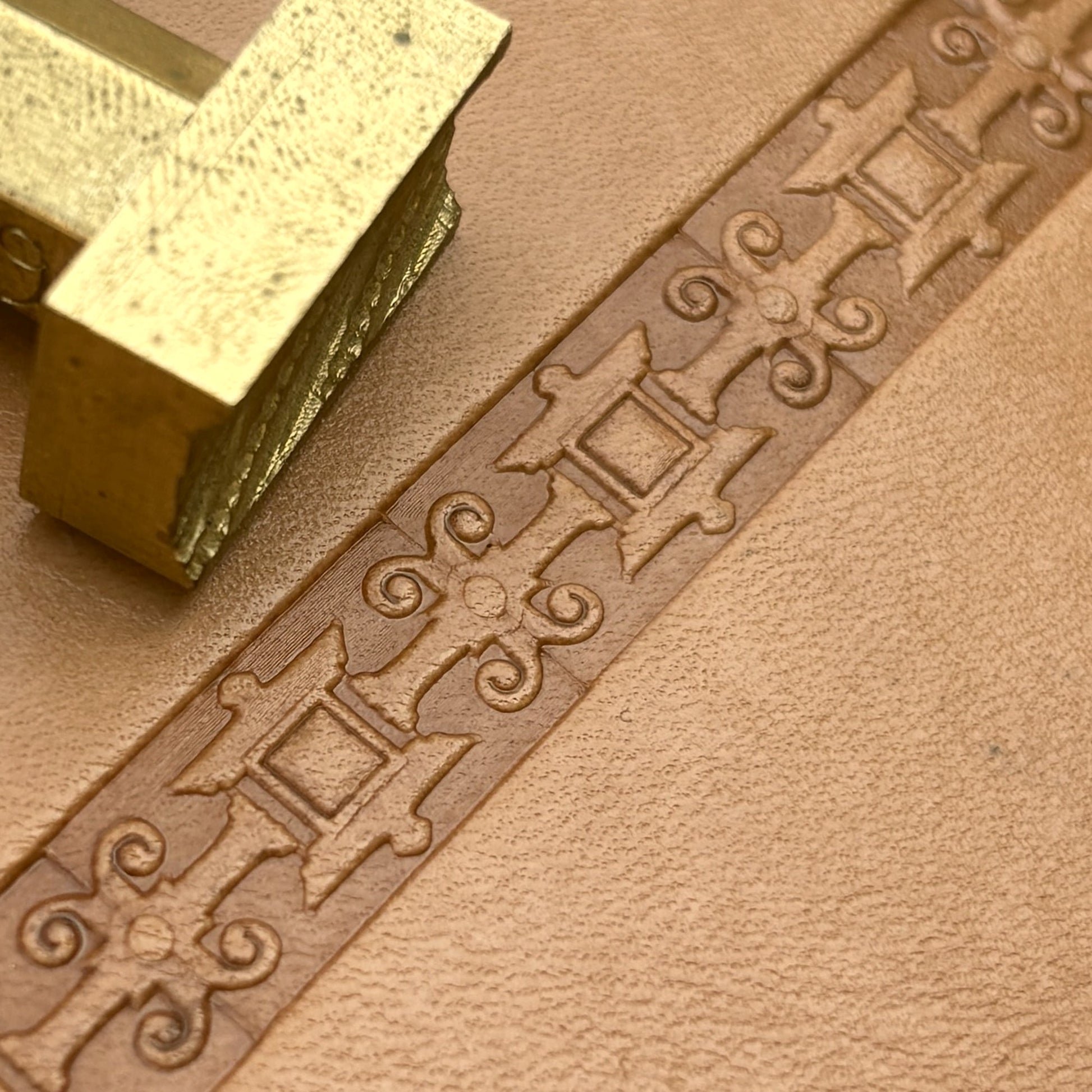Ornate Border Geometric leather stamp LT175 — brass stamping tool with imprint on natural veg-tan leather