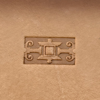 Ornate Border Geometric leather stamp LT175 — single impression on veg-tan leather