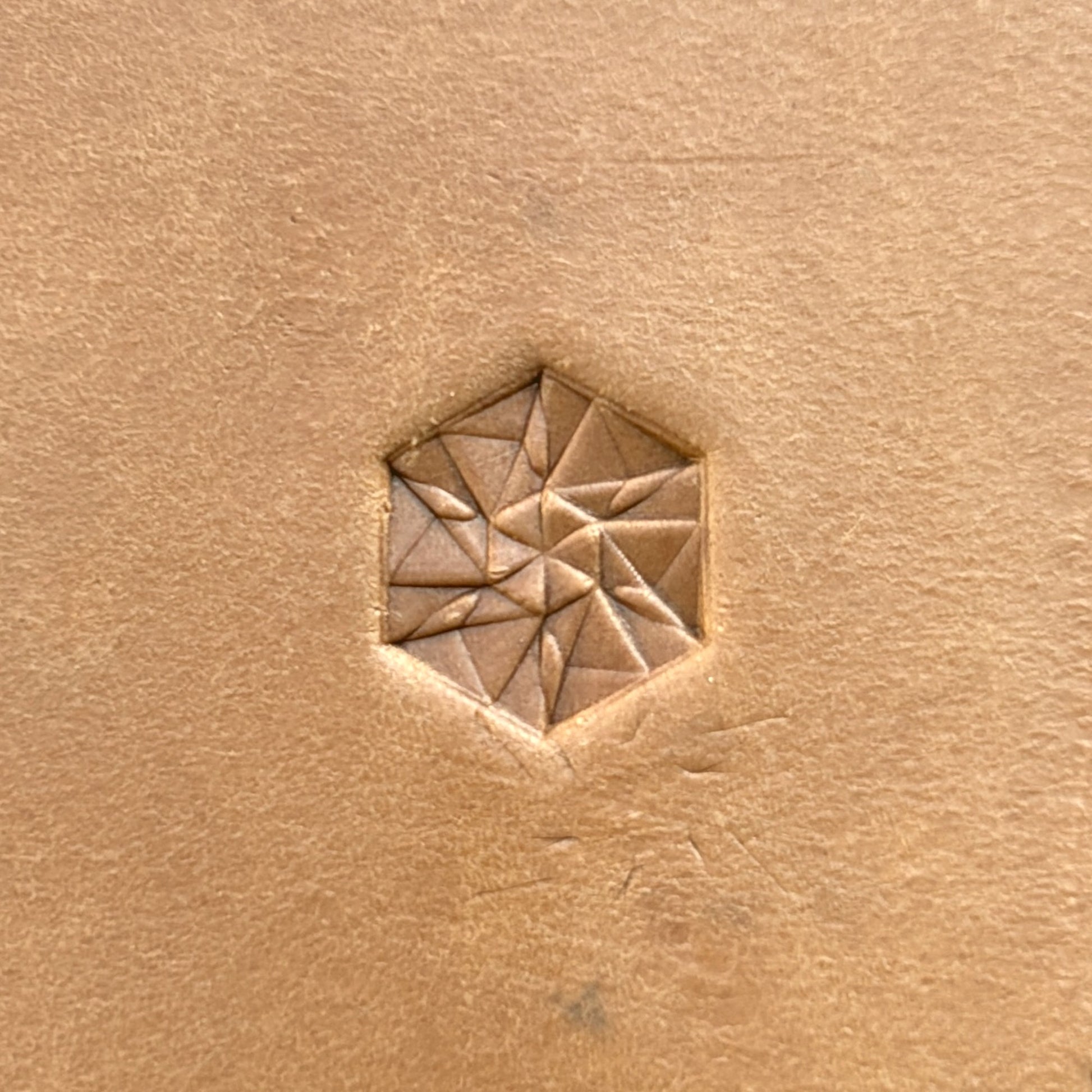 Hex Mosaic Geometric leather stamp LT177 — single impression on veg-tan leather