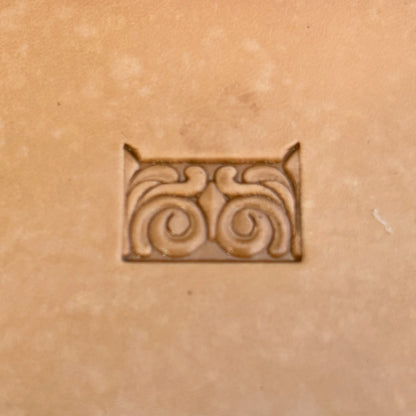 Swirl Border + Corner leather stamp LT178 — single impression on veg-tan leather