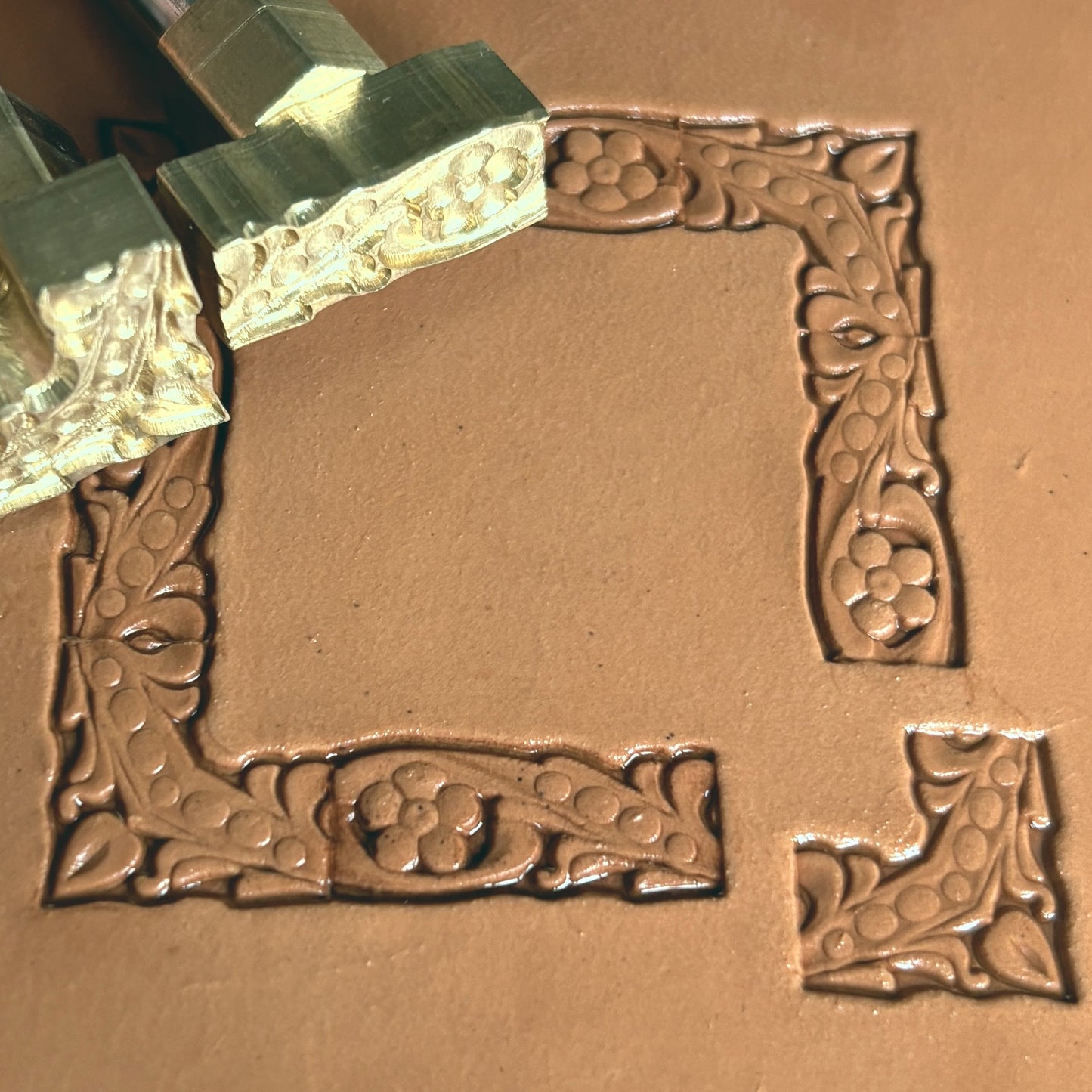 Flower leather stamp LT180 — brass stamping tool with imprint on natural veg-tan leather