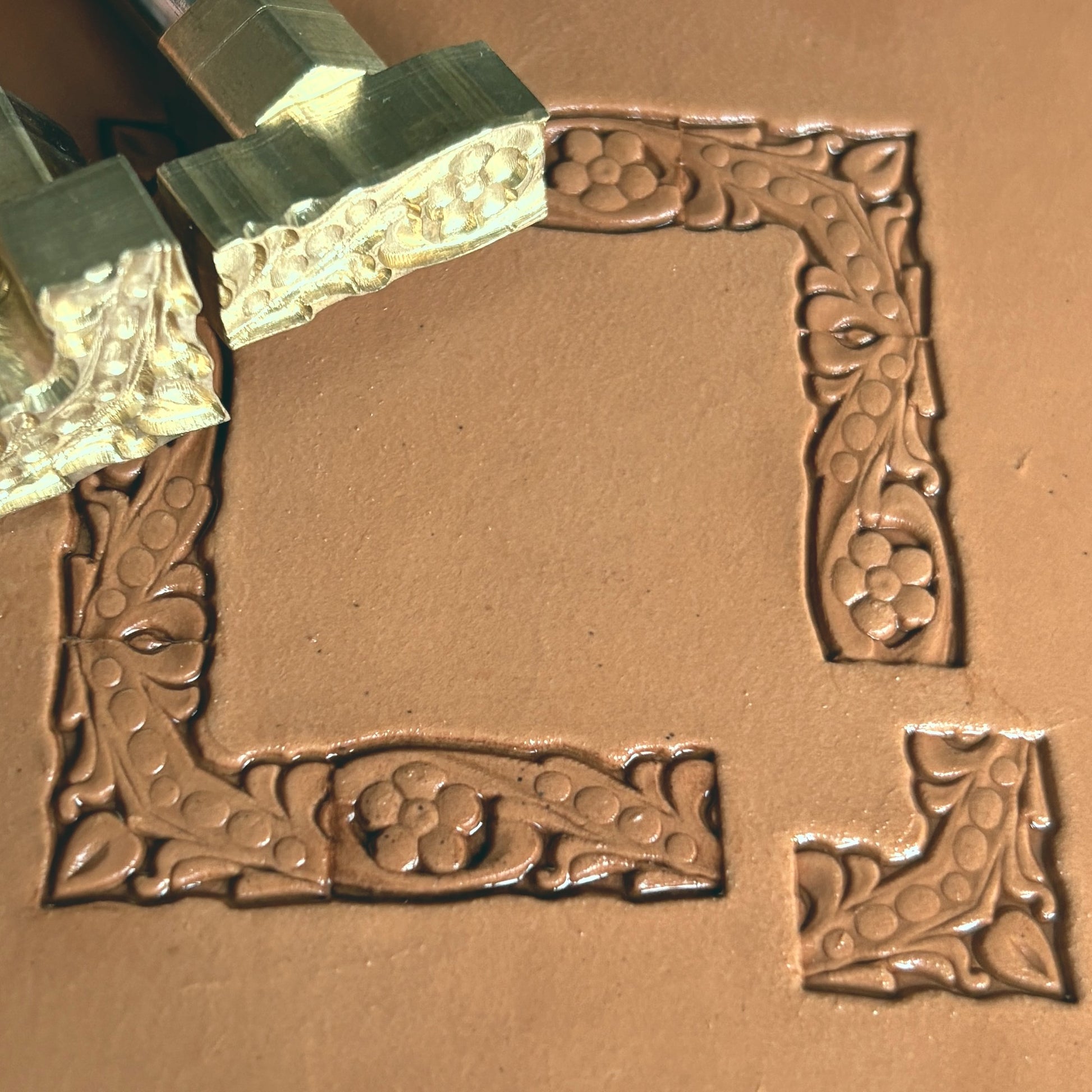 Flower leather stamp LT180 — brass stamping tool with imprint on natural veg-tan leather