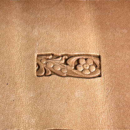 Flower leather stamp LT180 — single impression on veg-tan leather