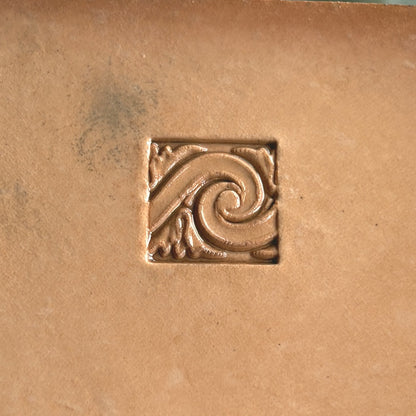 Swirl Border leather stamp LT181 — single impression on veg-tan leather