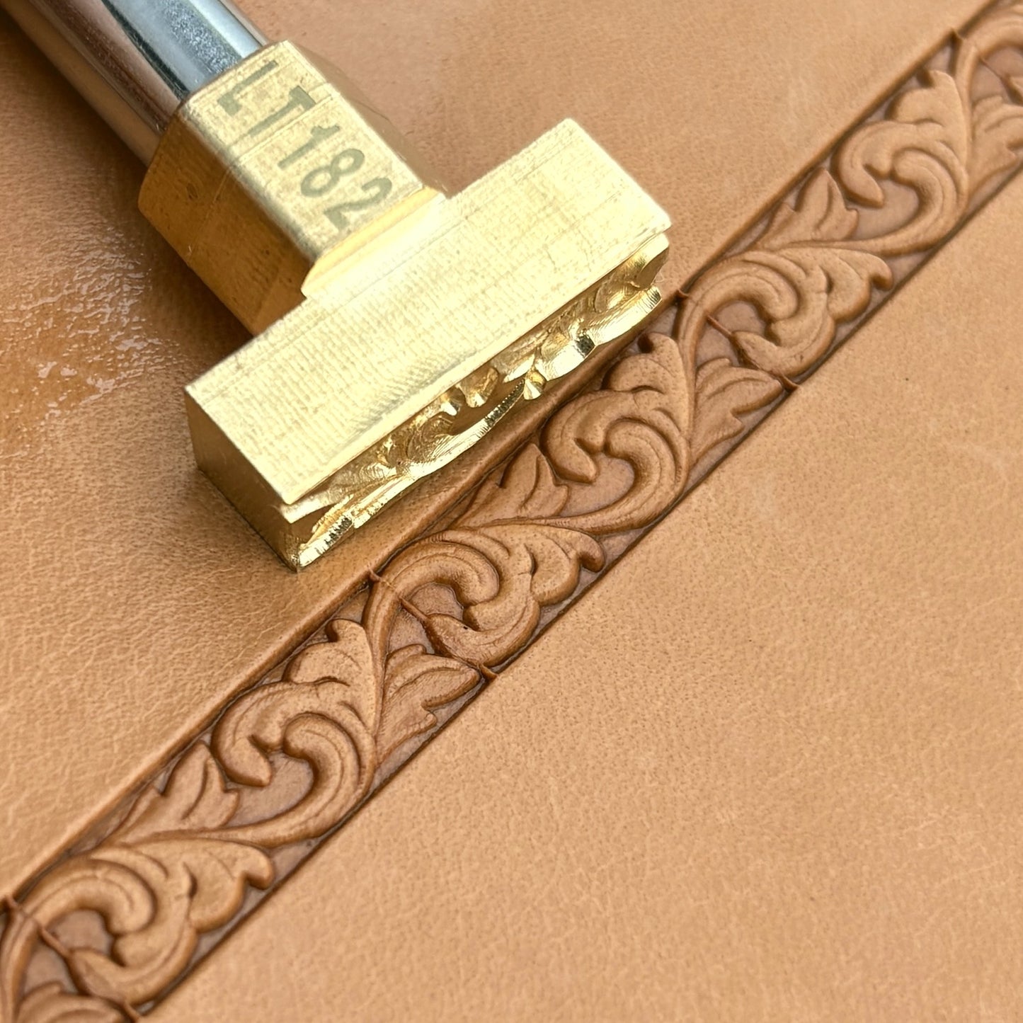Ornate Border leather stamp LT182 — brass stamping tool with imprint on natural veg-tan leather