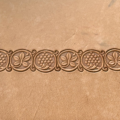 Grape Vine leather stamp LT184AB — repeating grape vine border pattern stamped along the middle of veg-tan leather