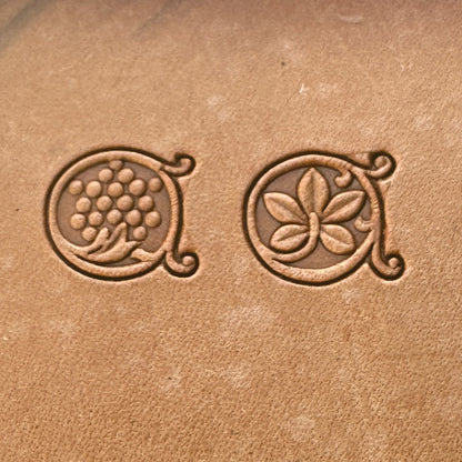 Grape Vine leather stamp LT184AB — single impressions of the grape cluster and vine leaf stamps on veg-tan leather