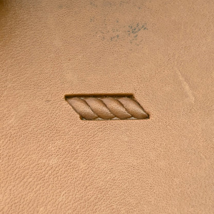 Rope Twist Border leather stamp LT190 — single impression on veg-tan leather