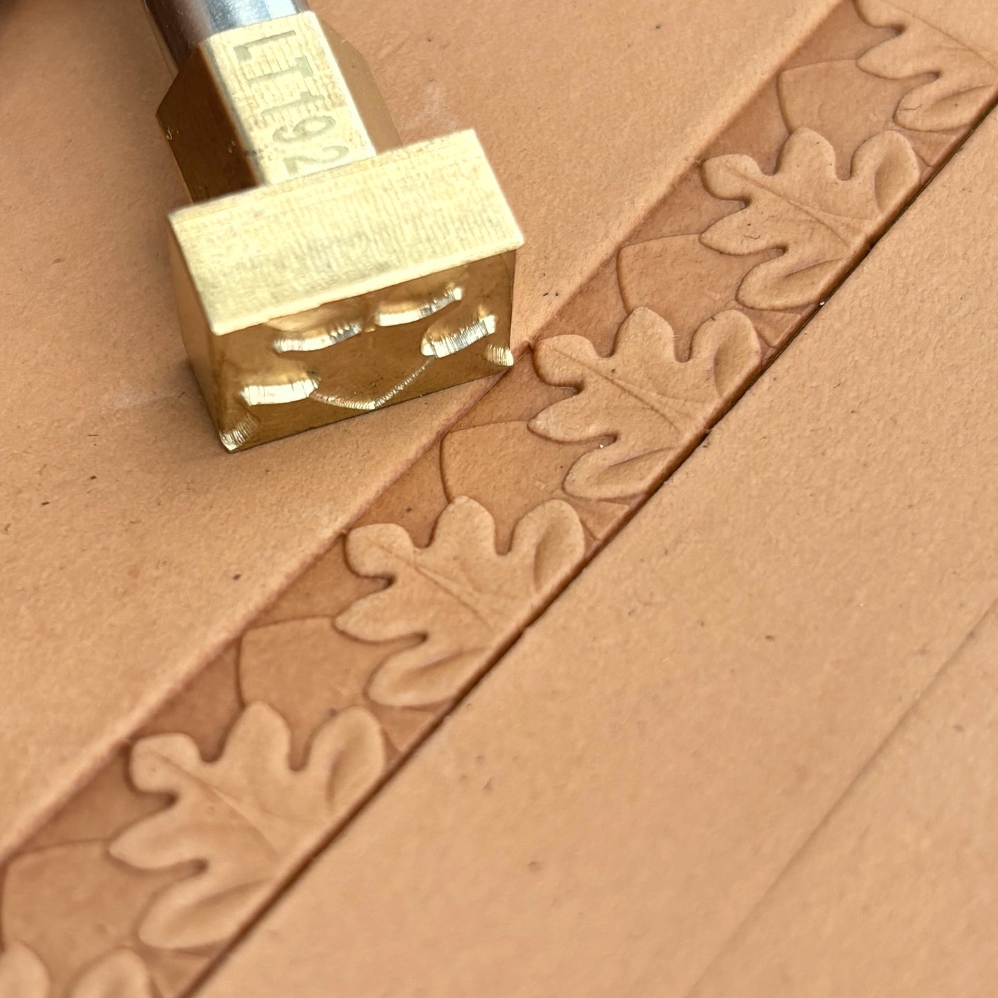 Oak Leaf leather stamp LT192 — brass stamping tool with imprint on natural veg-tan leather