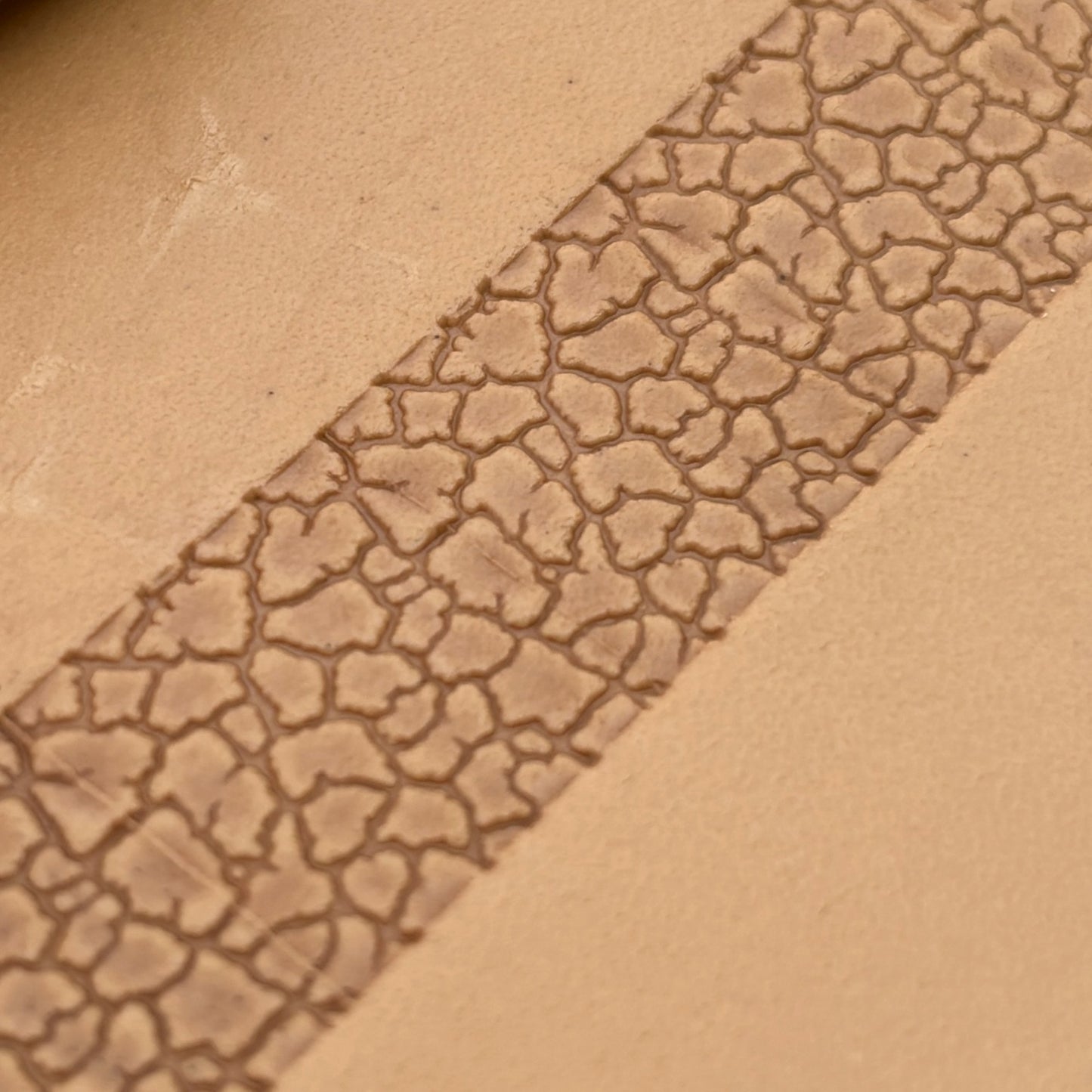 Cracked Earth leather stamp LT193 — pattern imprint on veg-tan leather