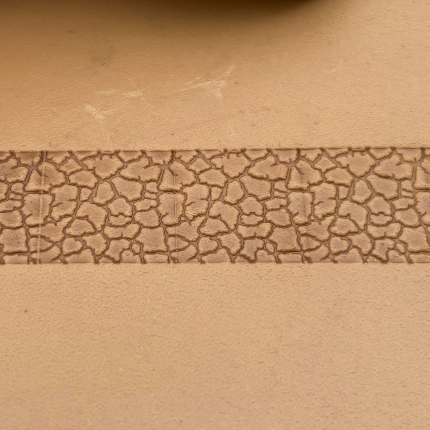 Cracked Earth leather stamp LT193 — pattern imprint on veg-tan leather