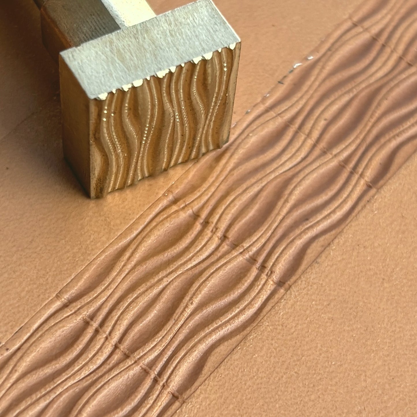 Wavy Lines leather stamp LT195 — brass stamping tool with imprint on natural veg-tan leather