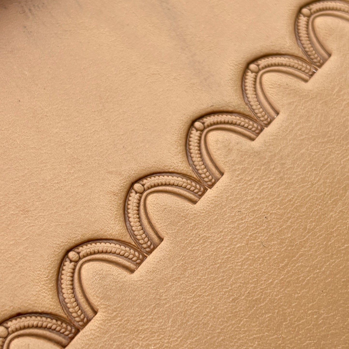Arch Border leather stamp LT196 — pattern imprint on veg-tan leather