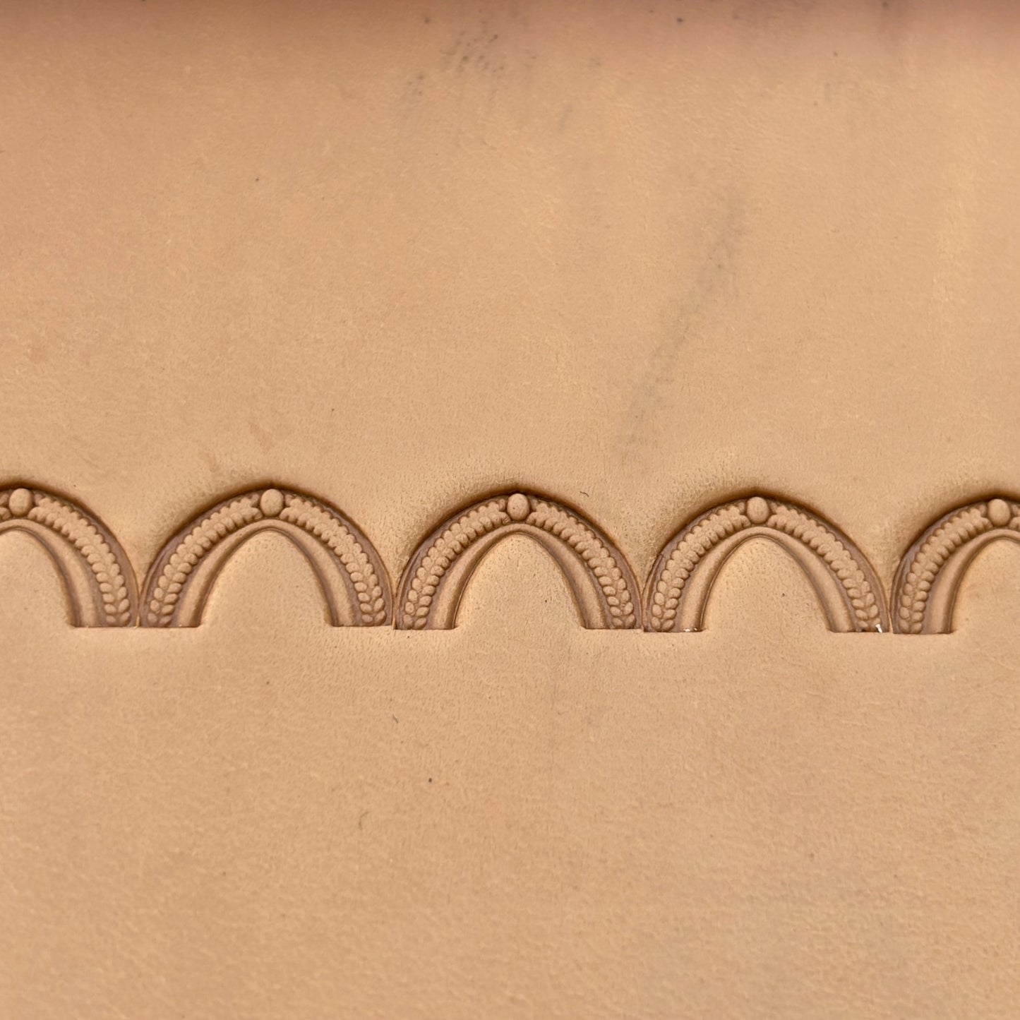 Arch Border leather stamp LT196 — pattern imprint on veg-tan leather