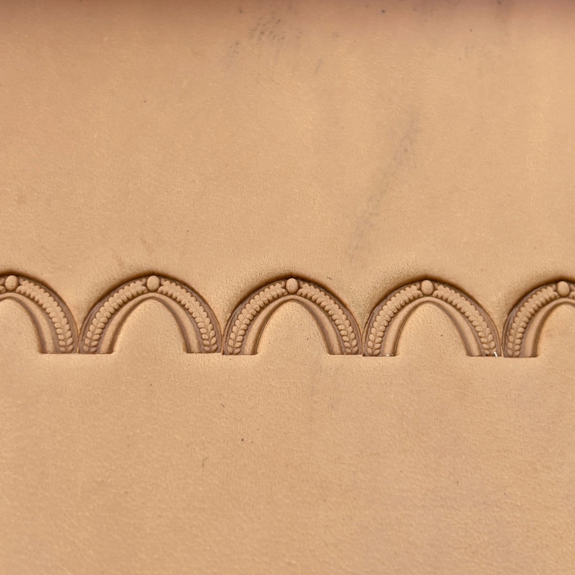 Arch Border leather stamp LT196 — pattern imprint on veg-tan leather