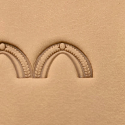Arch Border leather stamp LT196 — single impression on veg-tan leather
