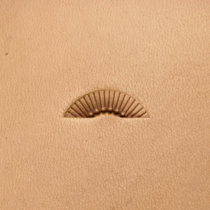 Radiant Curve Stitches leather stamp LT197 — single impression on veg-tan leather