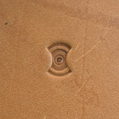 Concentric Cross Geometric leather stamp LT202 — single impression on veg-tan leather