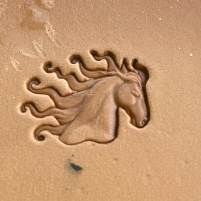 Horse leather stamp LT204 — single impression on veg-tan leather