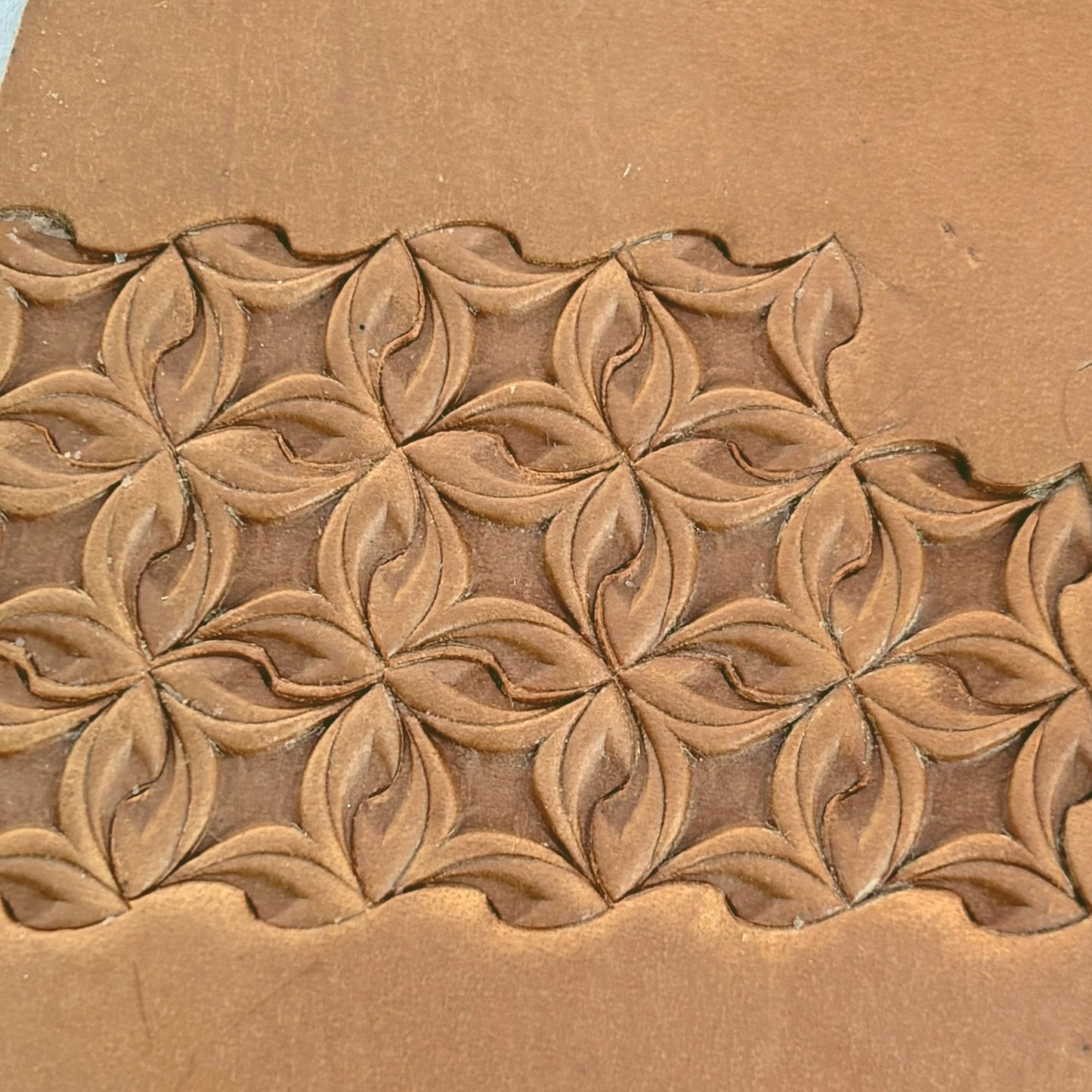 Petal Geometry leather stamp LT208 — pattern imprint on veg-tan leather