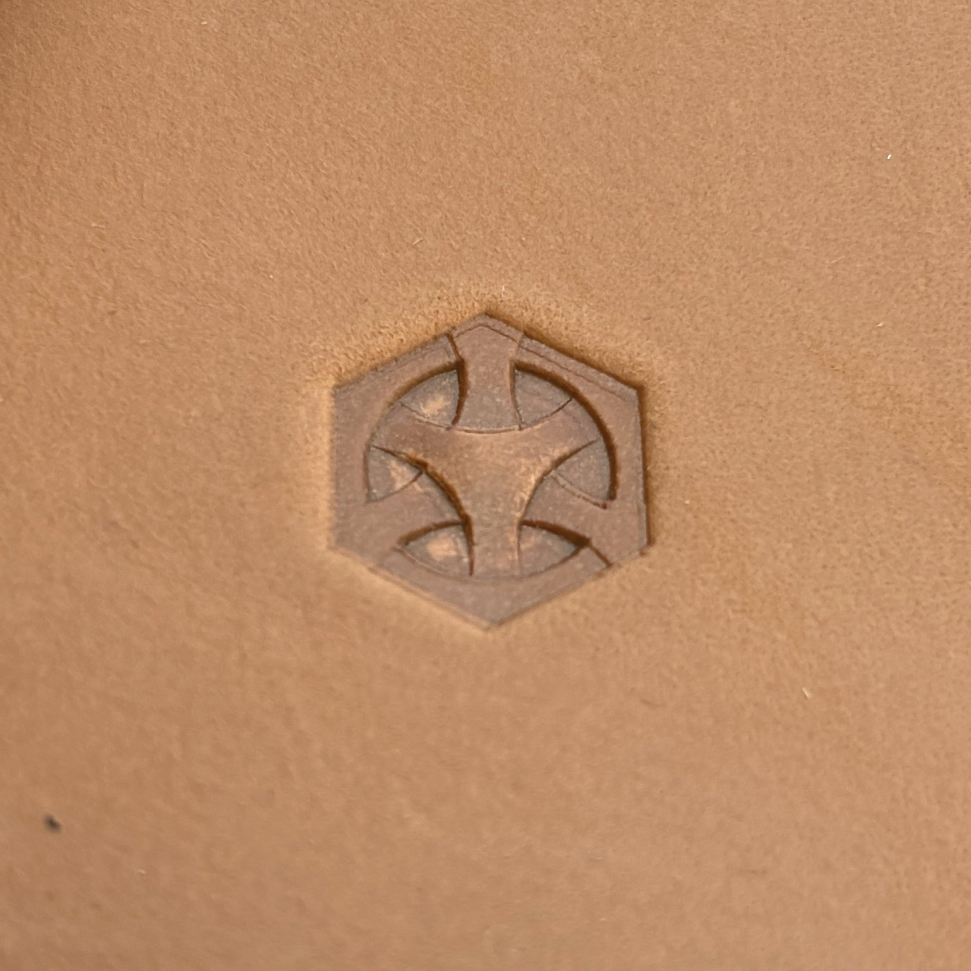 Geometric leather stamp LT209 — single impression on veg-tan leather