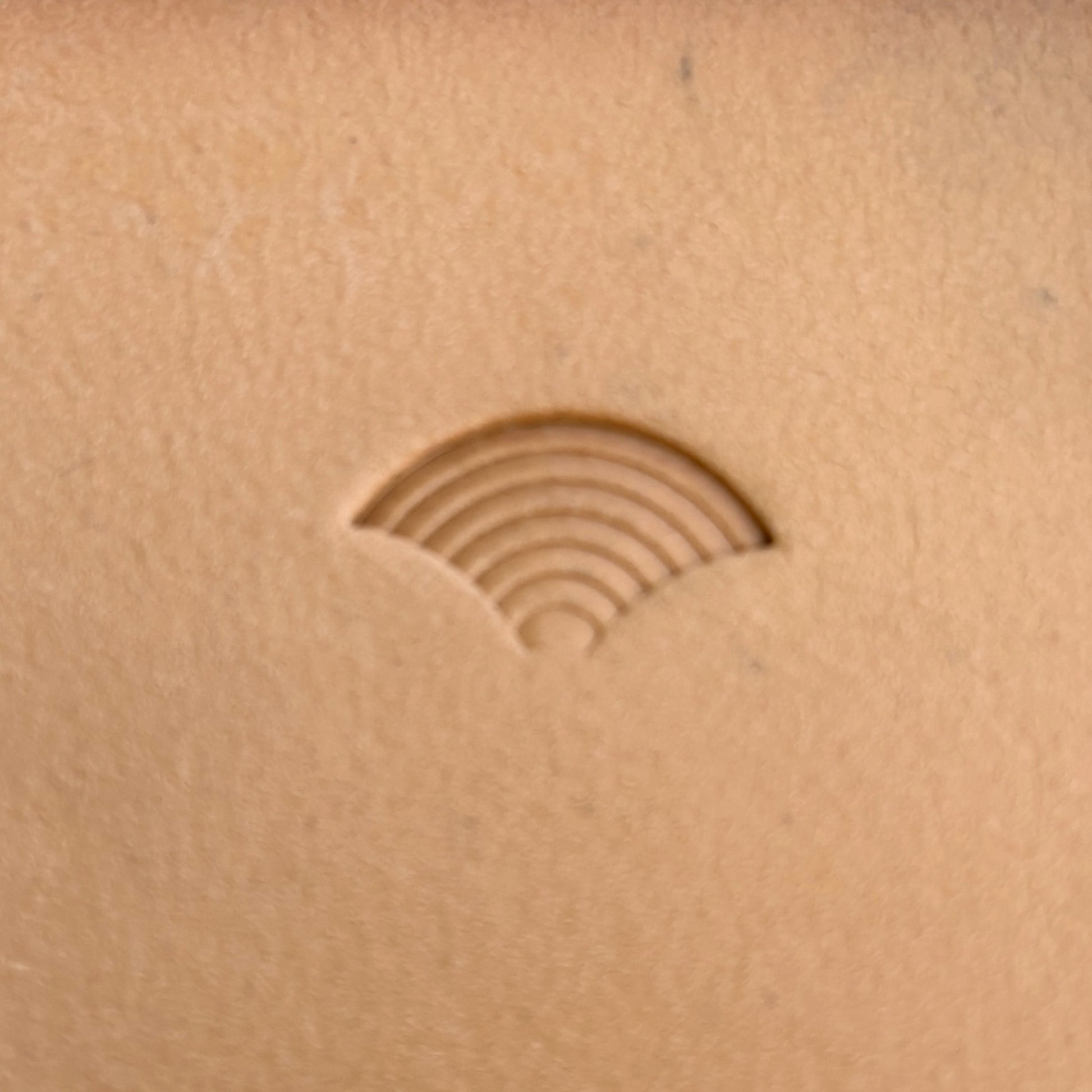 Seigaiha Waves 1 leather stamp LT211 — single impression on veg-tan leather