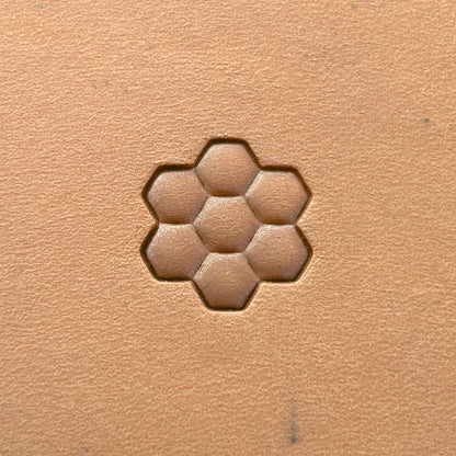 Honeycomb Bee leather stamp LT212 — single impression on veg-tan leather
