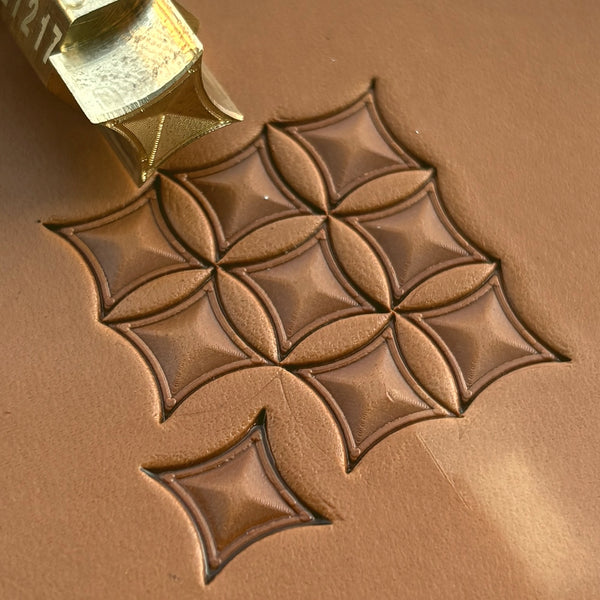 Geometric leather stamp LT217 — brass stamping tool with imprint on natural veg-tan leather