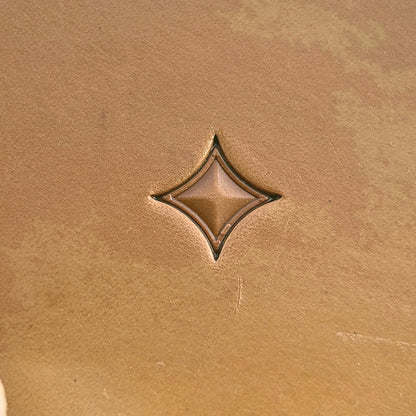 Geometric leather stamp LT217 — single impression on veg-tan leather