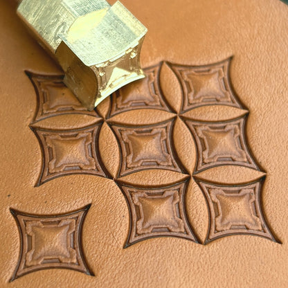Geometric leather stamp LT220 — brass stamping tool with imprint on natural veg-tan leather