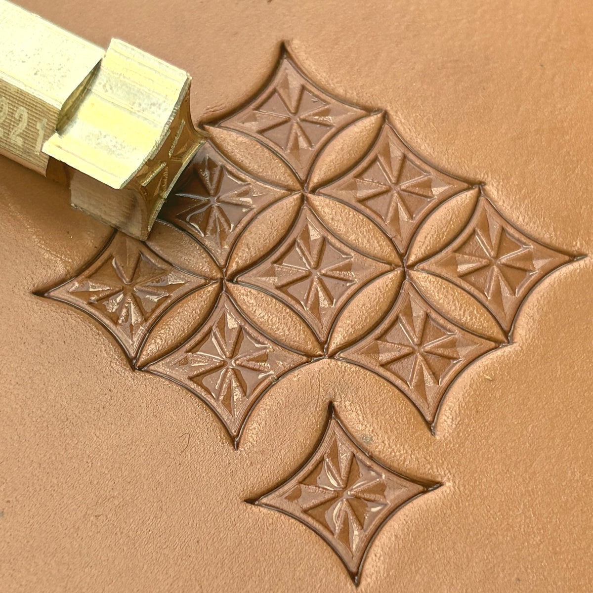 Star Tile Geometric leather stamp LT221 — brass stamping tool with imprint on natural veg-tan leather