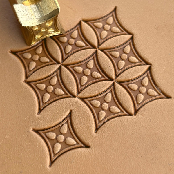 Geometric leather stamp LT222 — brass stamping tool with imprint on natural veg-tan leather