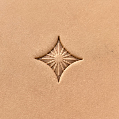 Starburst Geometric leather stamp LT223 — single impression on veg-tan leather