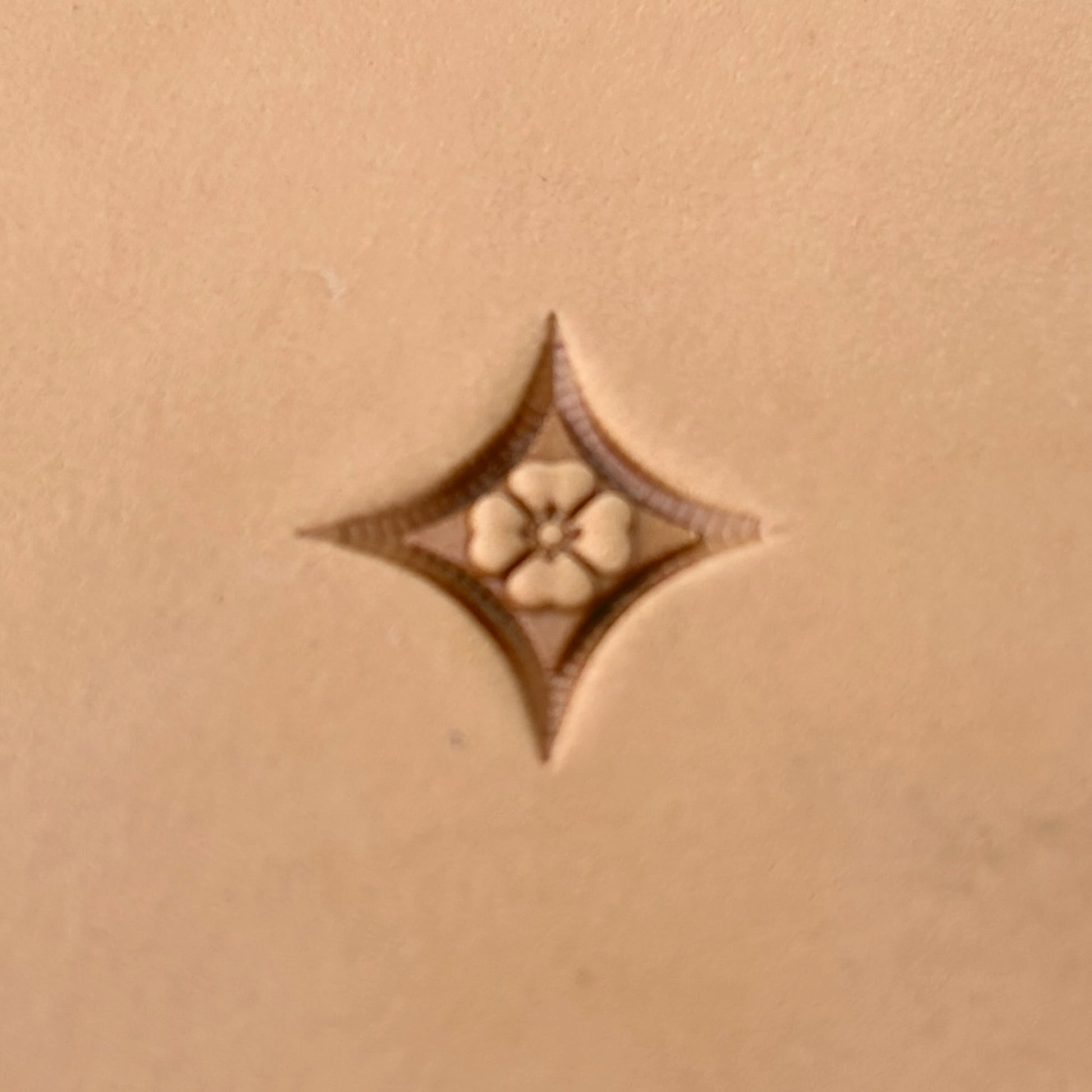 Floral Tiles Geometric leather stamp LT224 — single impression on veg-tan leather