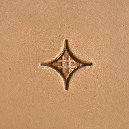 Geometric leather stamp LT226 — single impression on veg-tan leather