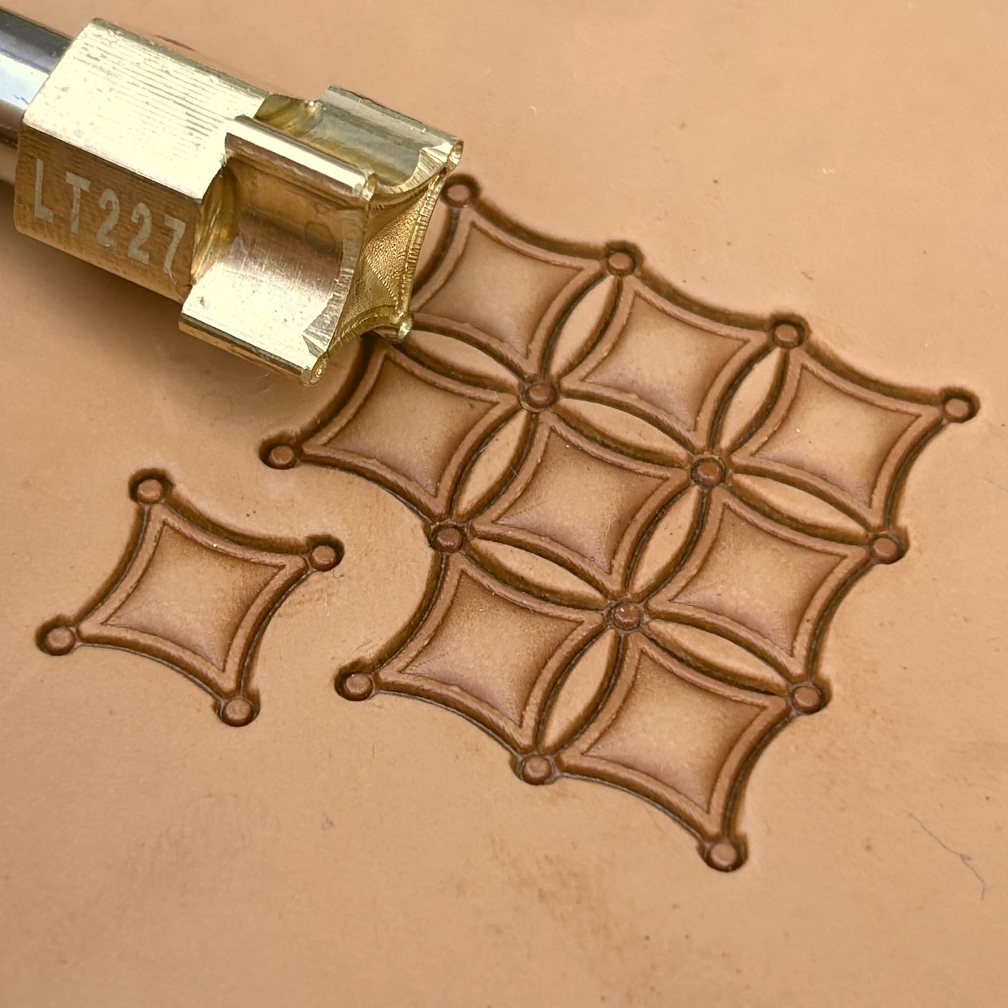 Overlapping Diamonds Geometric leather stamp LT227 — brass stamping tool with imprint on natural veg-tan leather