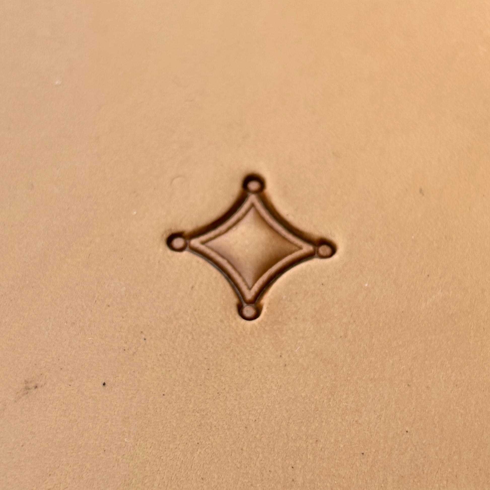 Overlapping Diamonds Geometric leather stamp LT227 — single impression on veg-tan leather
