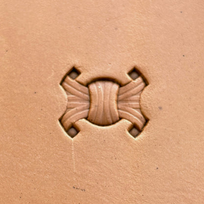 Interlocking Design leather stamp LT229 — single impression on veg-tan leather