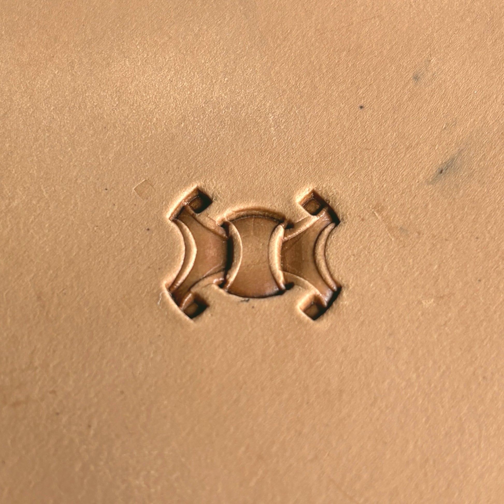 Basket Weave leather stamp LT230 — single impression on veg-tan leather