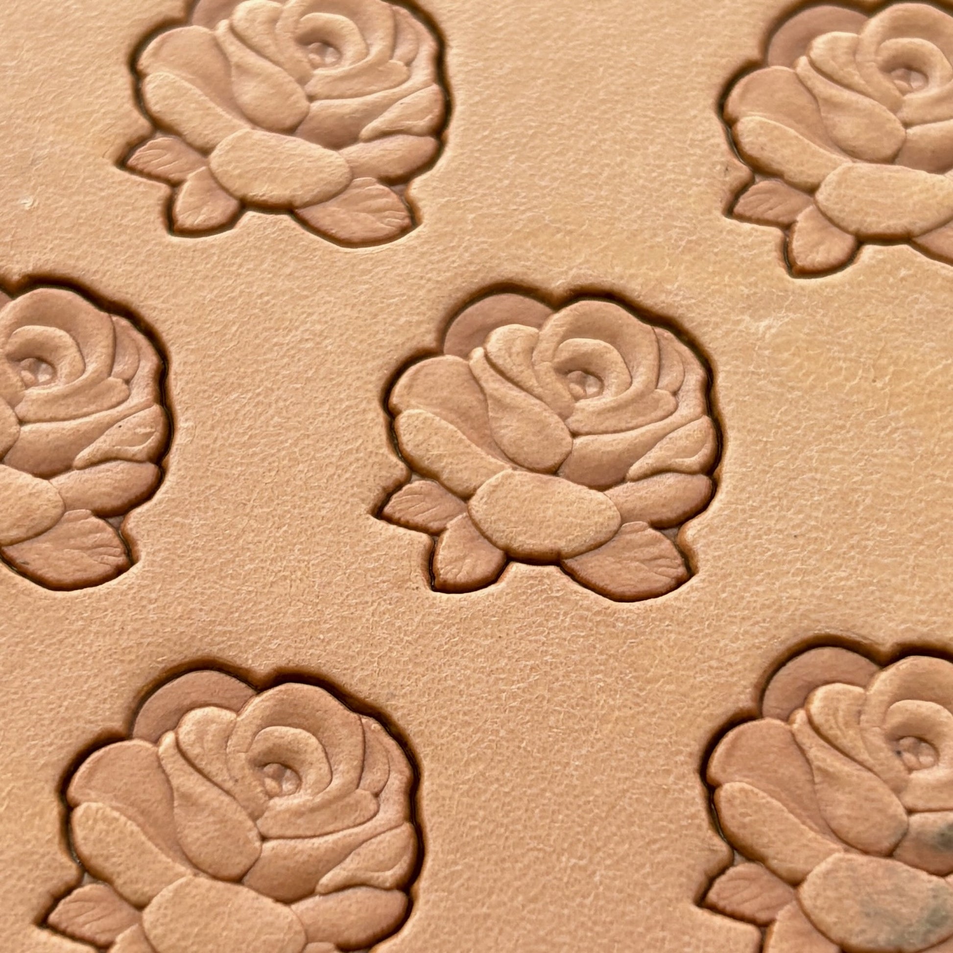 Small Cluster Rose leather stamp LT235 — pattern imprint on veg-tan leather