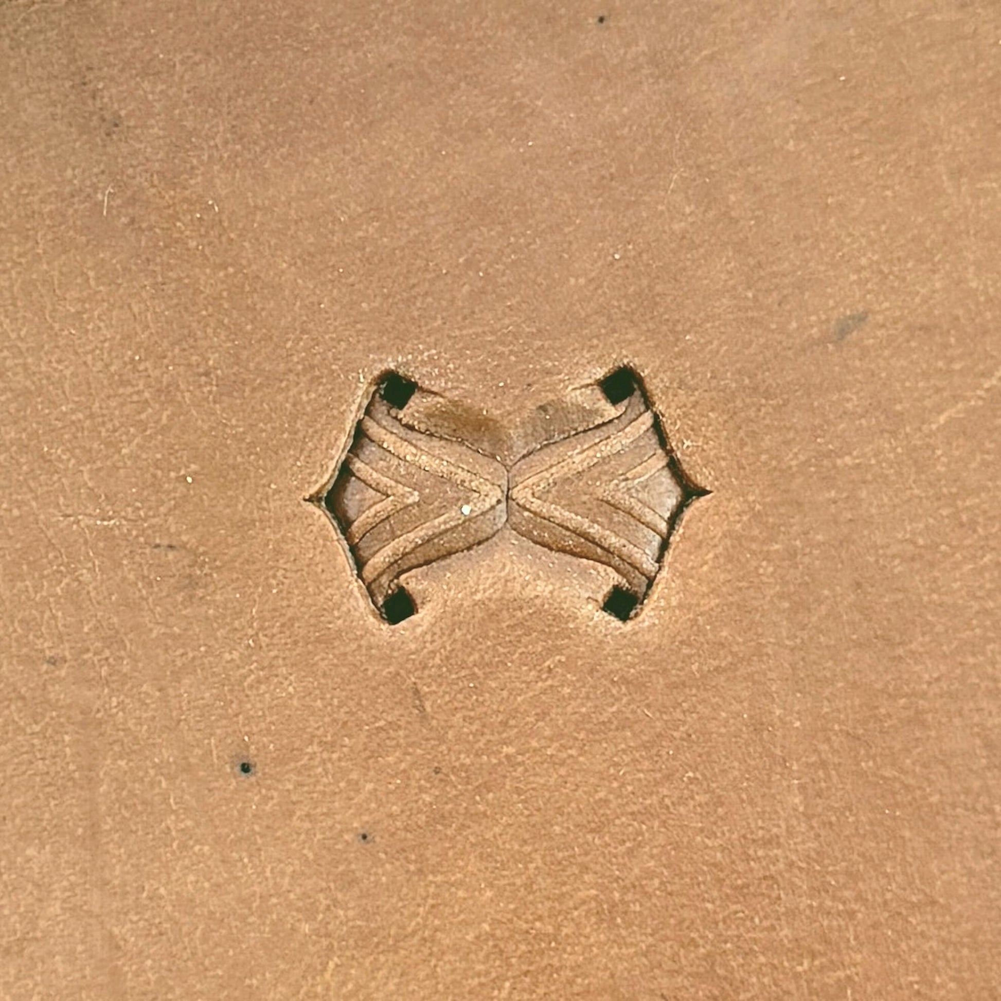 Motif Geometric leather stamp LT242 — single impression on veg-tan leather