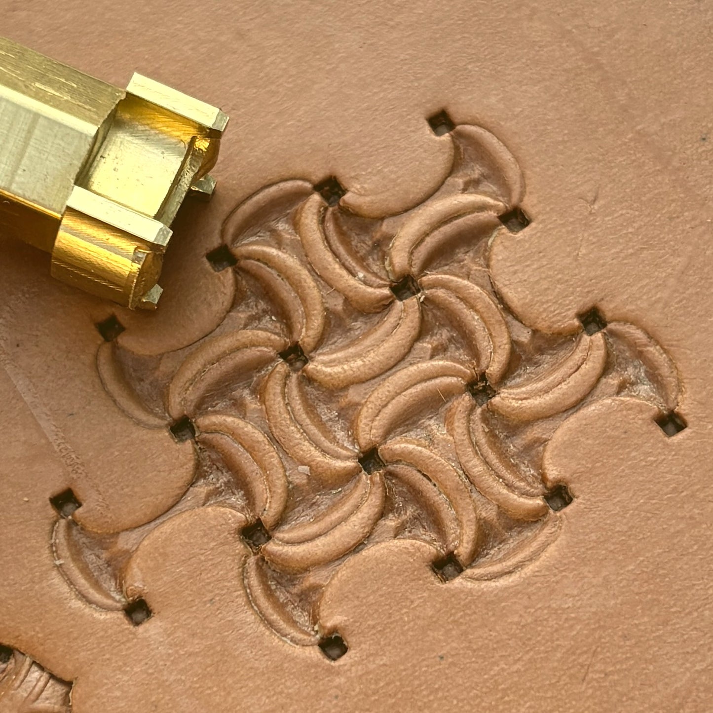 Interlocking Crescents leather stamp LT244 — brass stamping tool with imprint on natural veg-tan leather