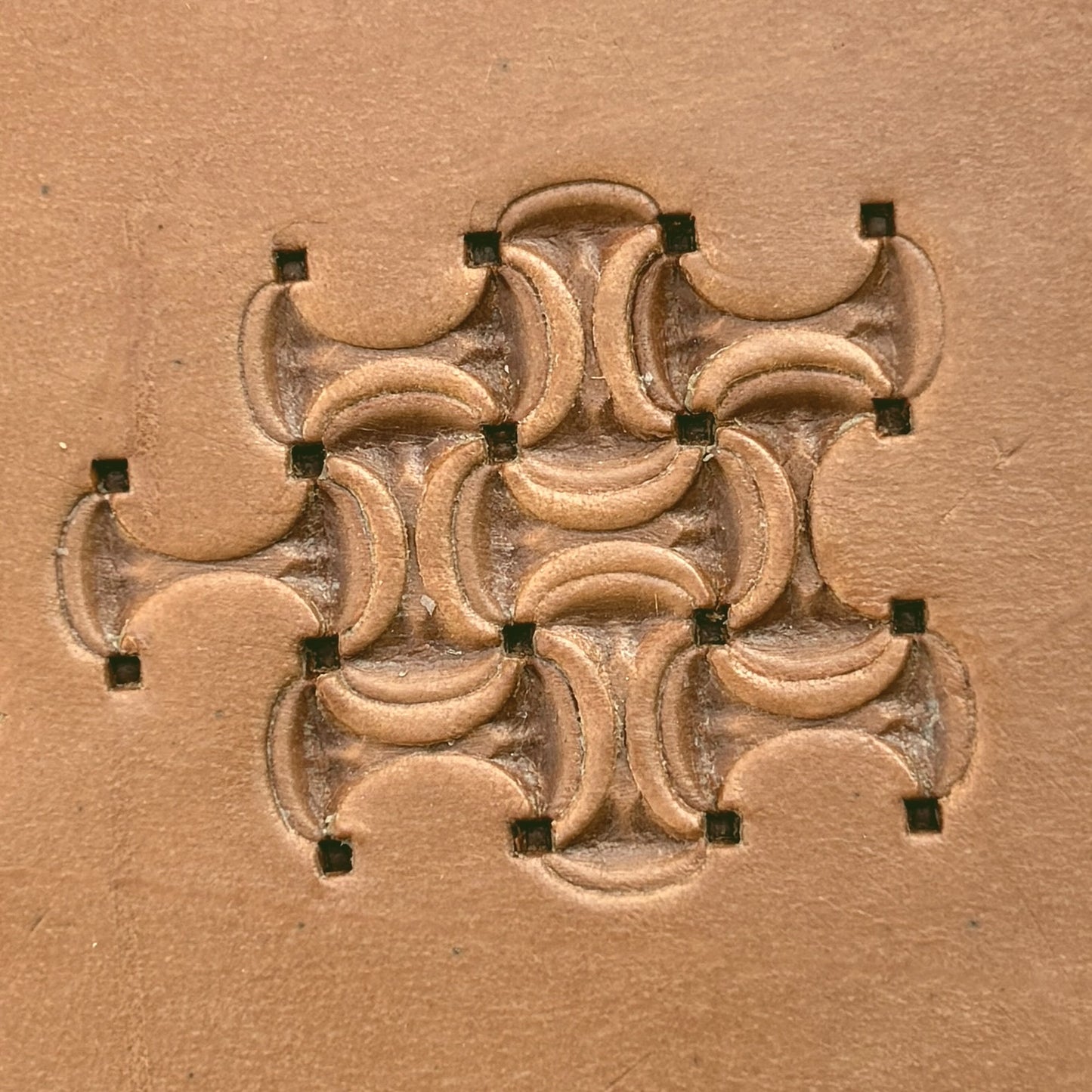 Interlocking Crescents leather stamp LT244 — pattern imprint on veg-tan leather