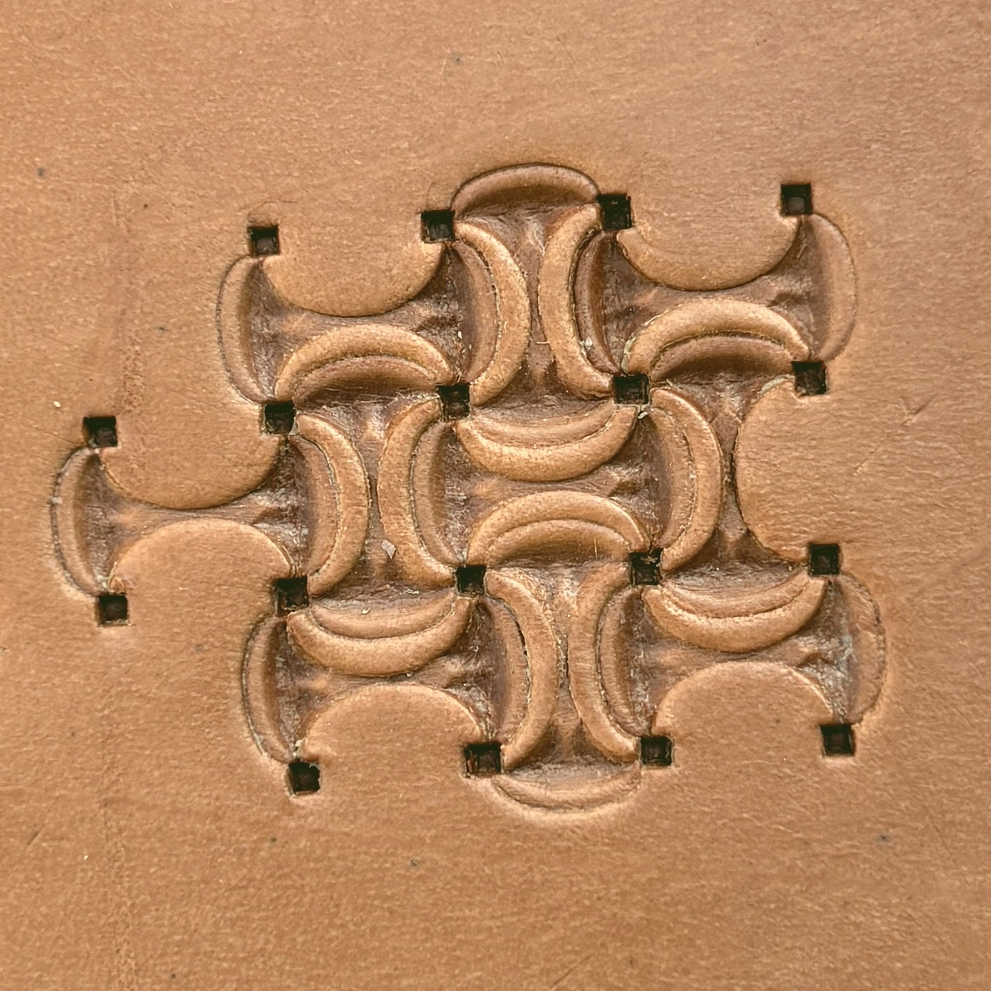 Interlocking Crescents leather stamp LT244 — pattern imprint on veg-tan leather