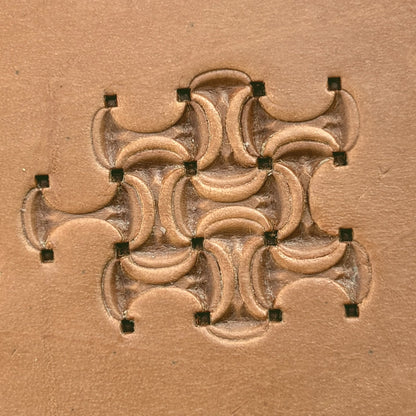 Interlocking Crescents leather stamp LT244 — pattern imprint on veg-tan leather