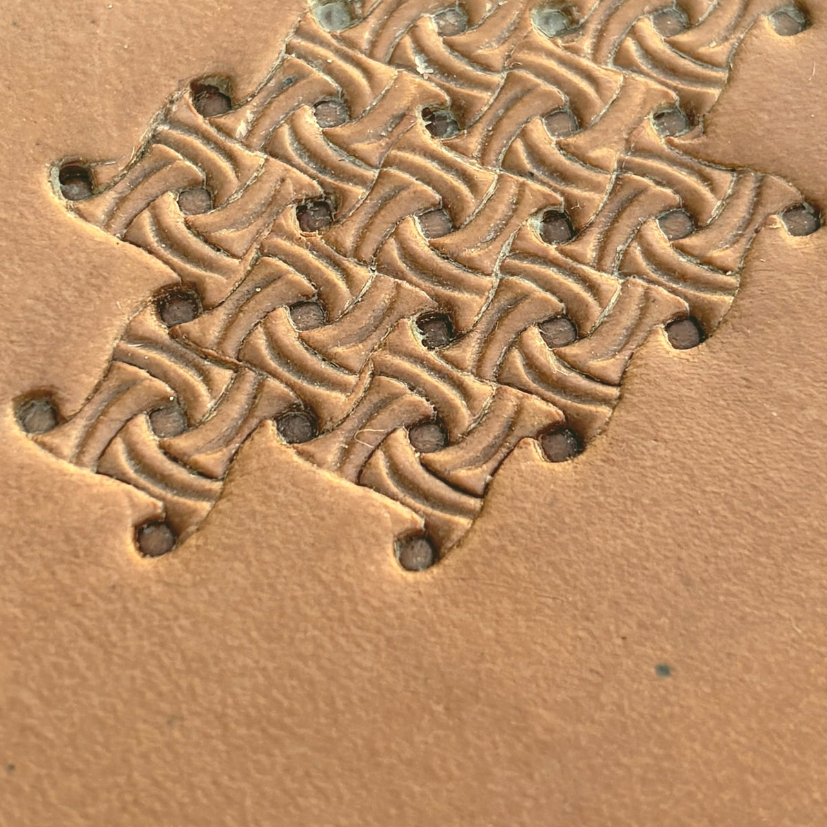 Interlocking Swirls Basket Weave leather stamp LT249 — pattern imprint on veg-tan leather