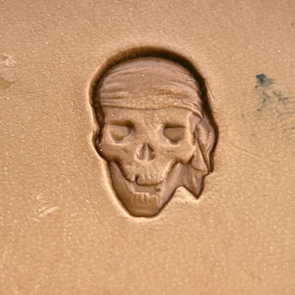 Skull leather stamp LT253 — single impression on veg-tan leather